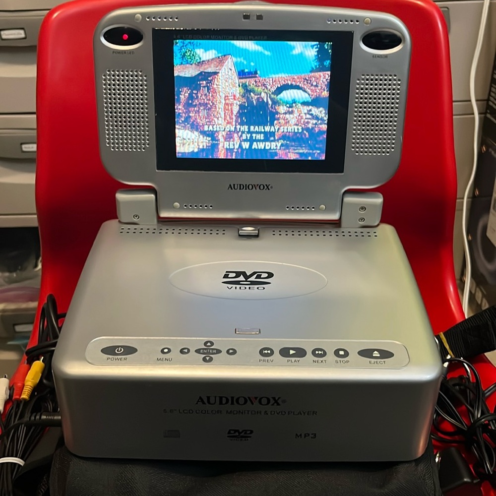 Audiovox 5.6” Portable DVD Player.